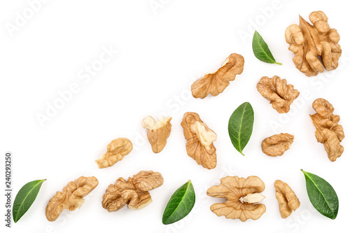 peelled Walnuts with leaves isolated on white background with copy space for your text. Top view. Flat lay
