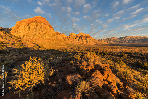 Morning light on peaks and ...