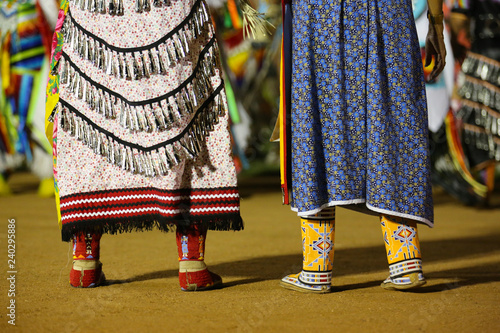 Фотография Feathers on costumes at an Indian Pow Wow