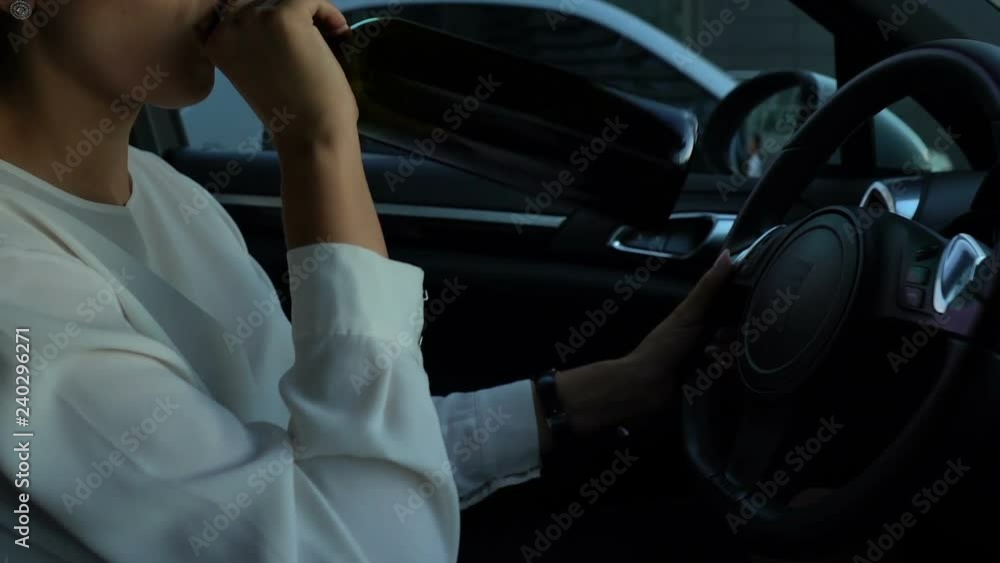 Successful business lady working on laptop pc, driving to important meeting Successful business lady working on laptop pc, driving to important meeting
