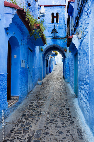 blue tunnel on the street in blue city Chefchaouen in Morocco © sergejson