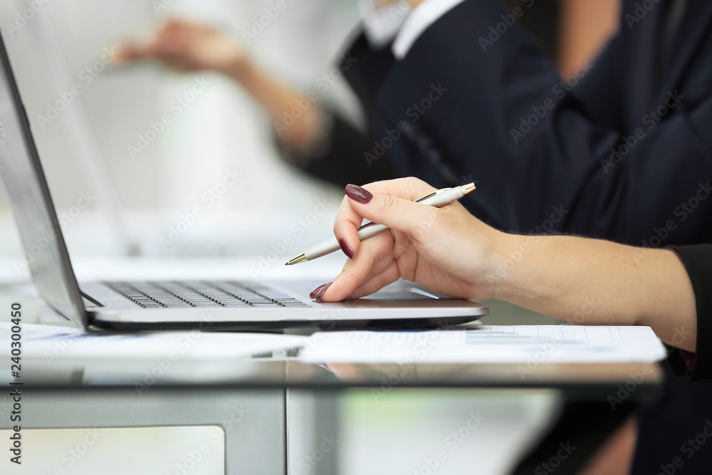 Fototapeta premium Woman's hands using laptop computer access internet searching information
