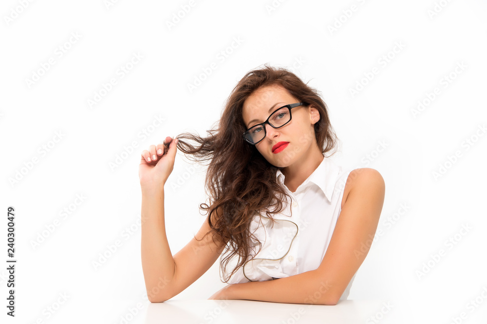 School teacher or student girl at table. Office life concept. Fashion and hairdresser beauty salon. Business manager. Businesswoman. Sexy woman in glasses with red lips. Confident graduate School teacher or student girl at table. Office life concept. Fashion and hairdresser beauty salon. Business manager. Businesswoman. Sexy woman in glasses with red lips. Confident graduate