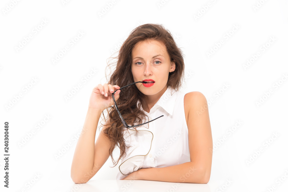 Full concentration at work. Sexy woman in glasses with red lips. School teacher or student girl at table. Fashion and hairdresser beauty salon. Office life concept. Business manager. Businesswoman Full concentration at work. Sexy woman in glasses with red lips. School teacher or student girl at table. Fashion and hairdresser beauty salon. Office life concept. Business manager. Businesswoman