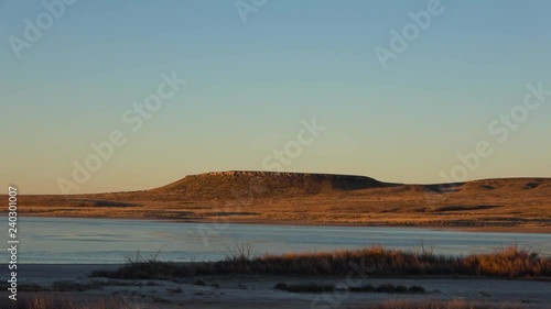 Beautiful landscape with lake on sunrise at the National Muleshoe Wildlife Refuge. photo