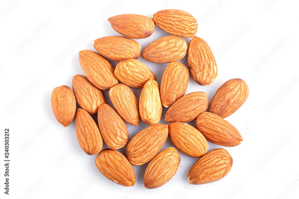 Pile of almonds isolated on white background. Pile of almonds isolated on white background.