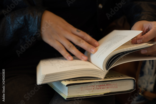 hands and book