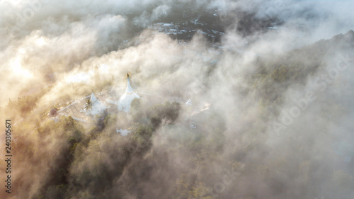 Konstfotografi An aerial shot Wat Phra That Doi Kong Mu Temple and misty morning, Famous tourist destination at Mae Hong Son Province, Thailand
