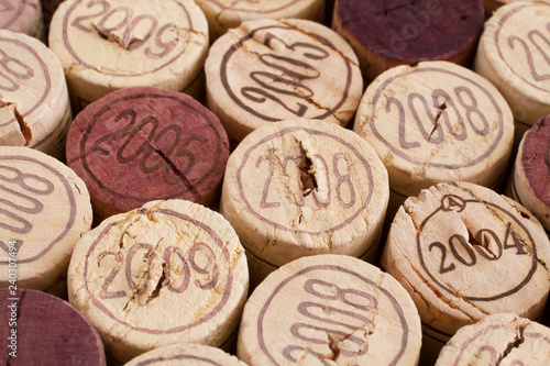 Cork wine bottle tops arranged tightly to each other. Closeup