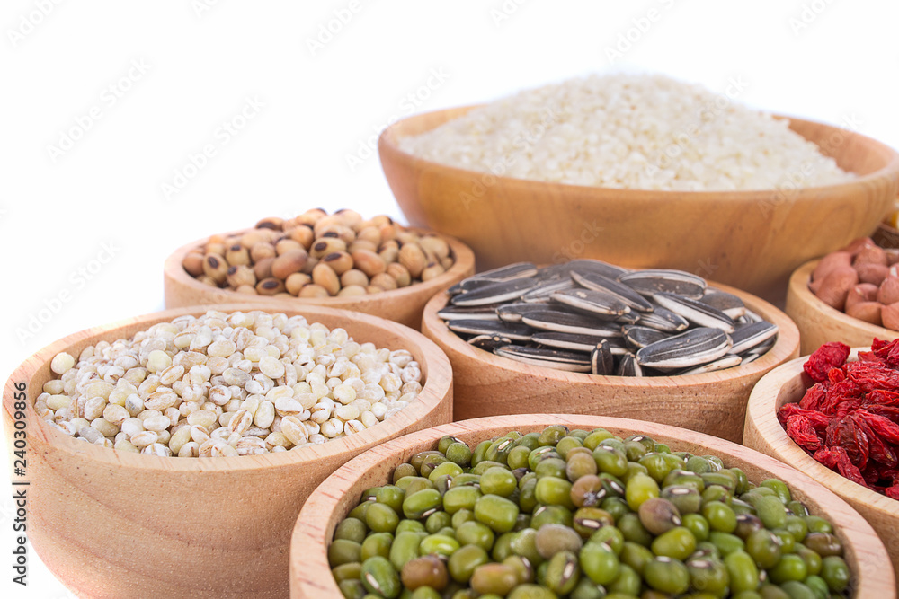 Cereal grains , seeds, beans on wooden background Cereal grains , seeds, beans on wooden background