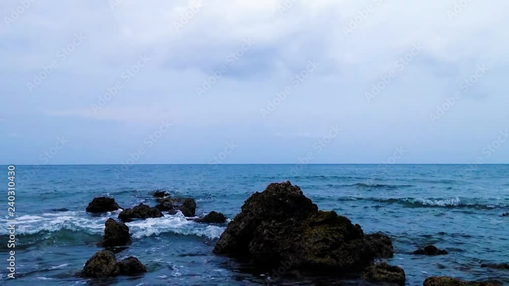 Beach Seawater Waves And Chunk Of Coral Reefs At Umeanyar Village, North Bali, Indonesia