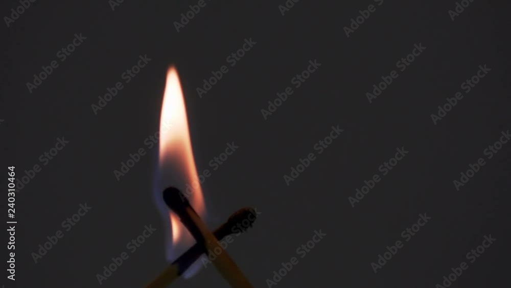 slow motion two burning matchsticks slow motion two burning matchsticks