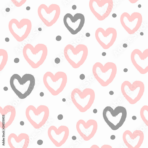 Repeated round dots and hearts drawn by hand with a rough brush. Cute watercolour seamless pattern. Paint, sketch, graffiti, watercolor.
