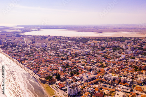 Beautiful view of the main street of Larnaca near the castle of Larnaca and Phinikoudes beach in Cyprus photo