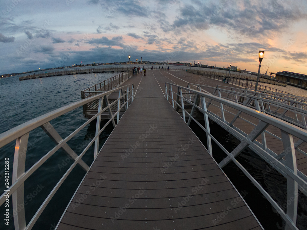 Fototapeta premium Floating walkway in the hanvana at sunset