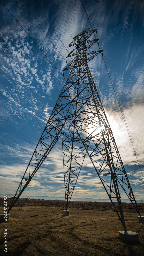 Fotografie high power electrical lines in the desert.