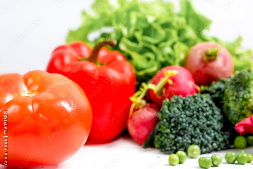 a fresh group of vegetables on white background