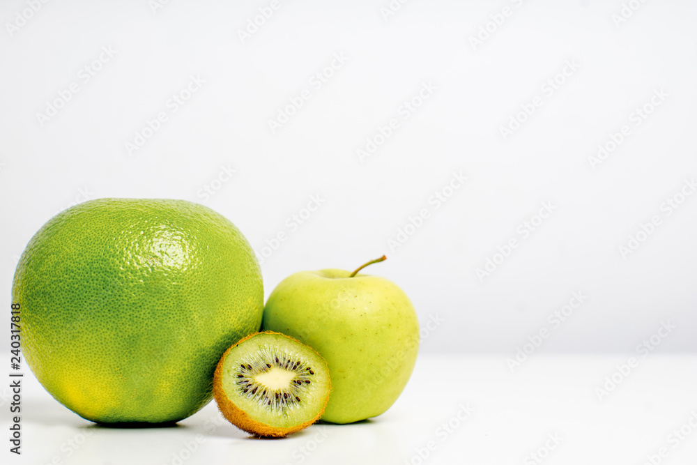 Creative layout made of fruits on a white background Creative layout made of fruits on a white background