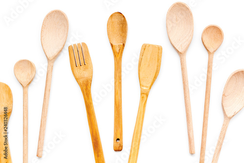Village wooden cutlery set on white background top view © 9dreamstudio