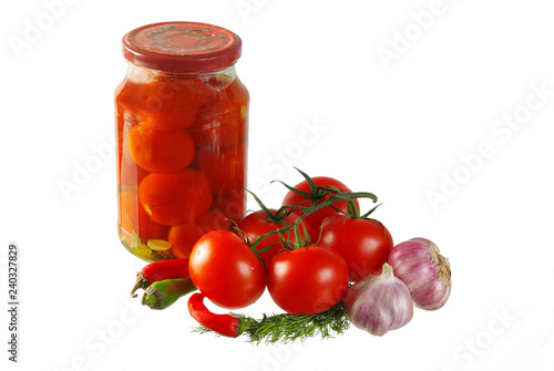 Preservation of tomatoes. Red Tomatoes, Peppers, Garlic and Canned Food