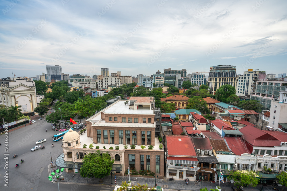 Aerial skyline view of Hanoi city, Vietnam. Hanoi cityscape by sunset period at August Revolution Square, with Hanoi Opera House Aerial skyline view of Hanoi city, Vietnam. Hanoi cityscape by sunset period at August Revolution Square, with Hanoi Opera House