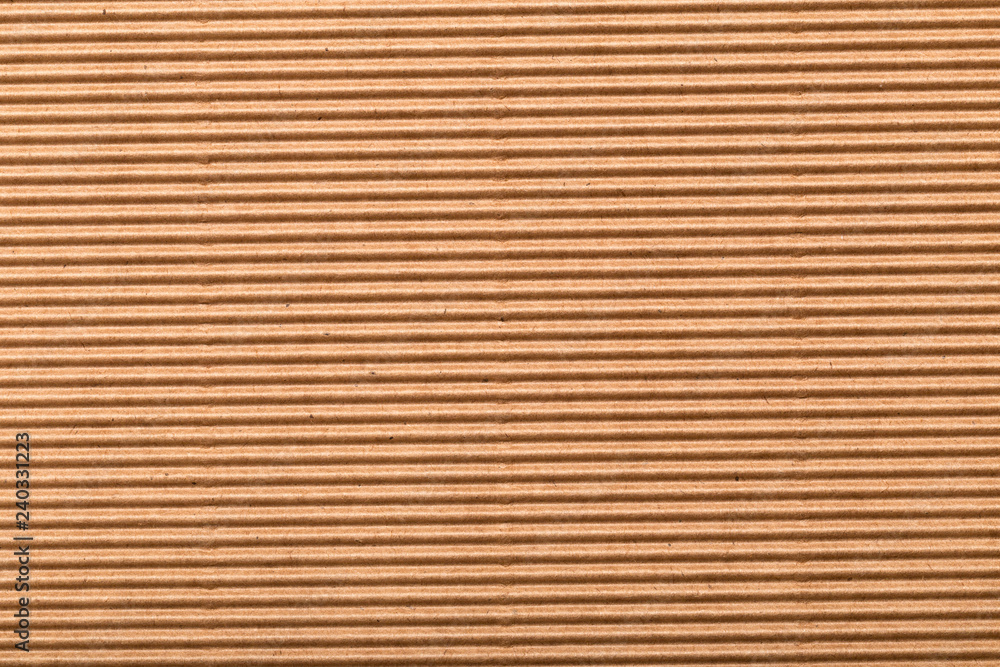 corrugated cardboard for packing. abstract background horizontal lines with wavy lines of beige color corrugated cardboard for packing. abstract background horizontal lines with wavy lines of beige color