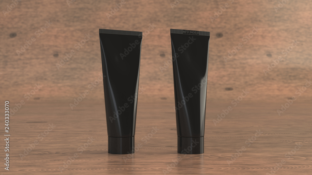 Pair of blank black tubes of toothpaste, cream or gel Pair of blank black tubes of toothpaste, cream or gel