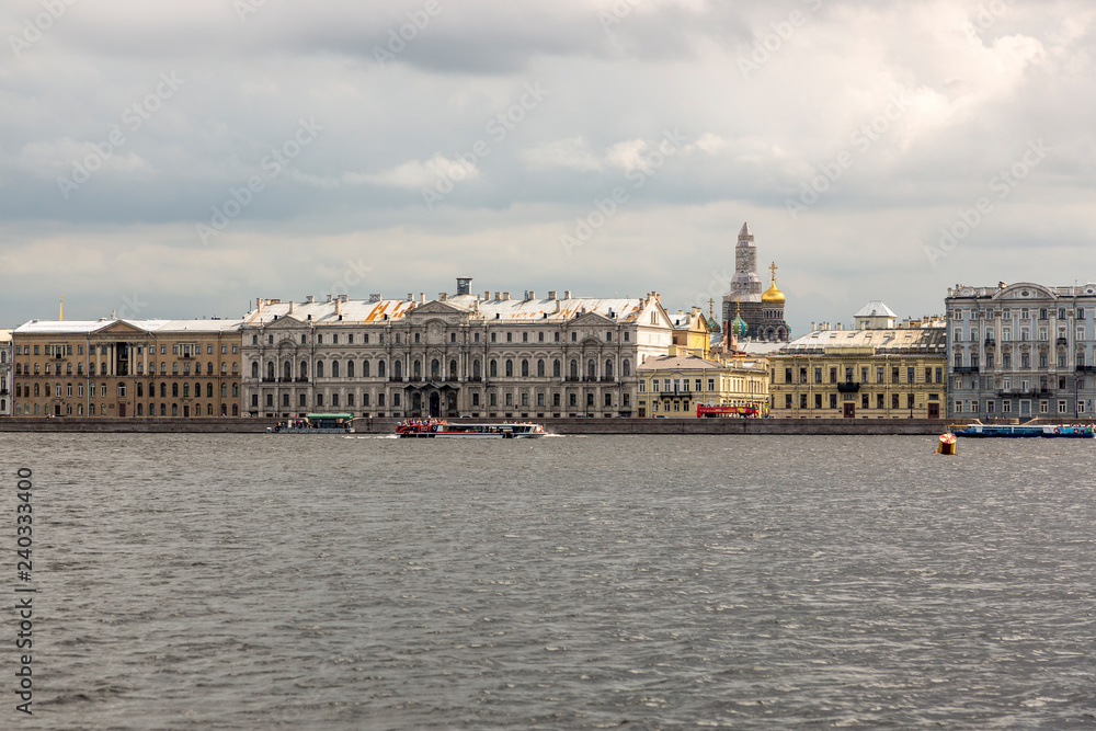 St. Petersburg, Russia - August 11, 2018: View of the Neva River and Palace Embankment of St. Petersburg