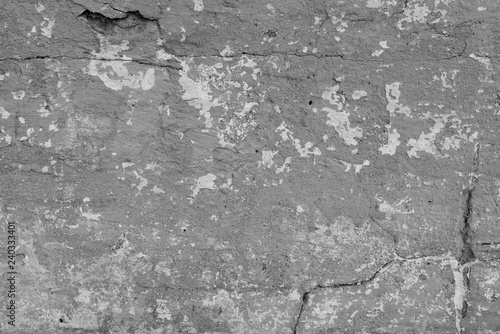 Texture, wall, concrete, it can be used as a background . Wall fragment with scratches and cracks © chernikovatv