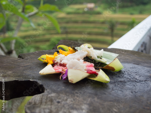 Canang sari is one of the daily offerings made by Balinese Hindus to thank the Sang Hyang Widhi Wasa in praise and prayer photo