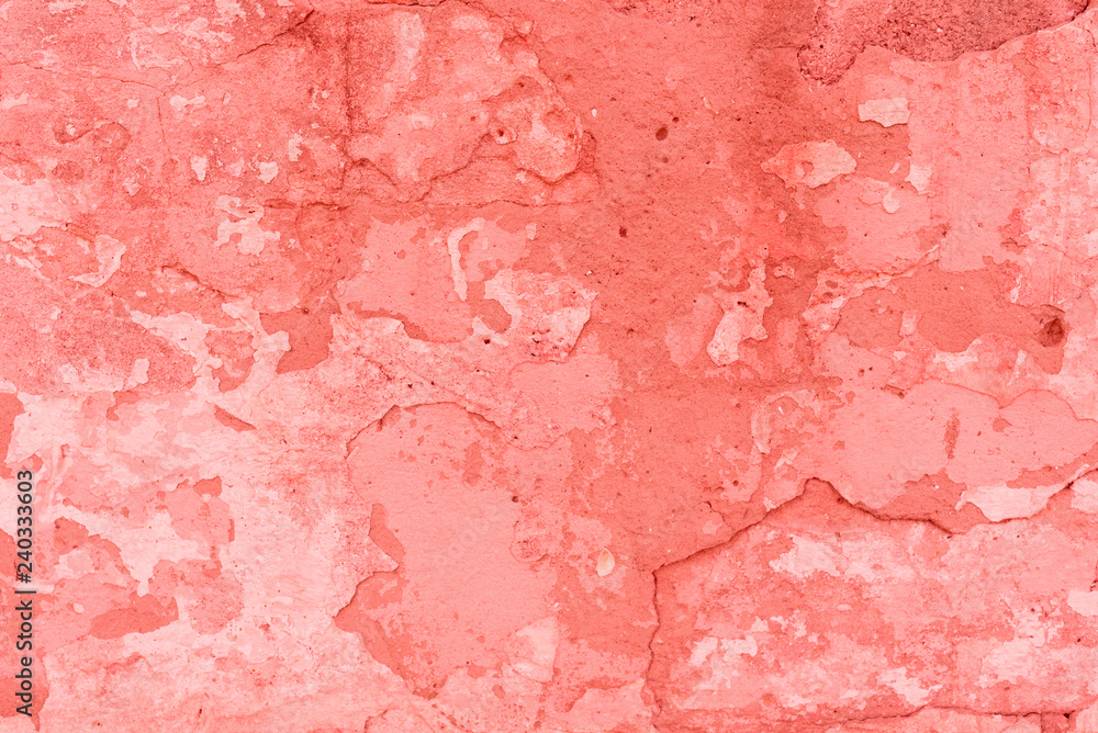 Fototapeta premium Texture, wall, concrete, living coral. It can be used as a background . Wall fragment with scratches and cracks
