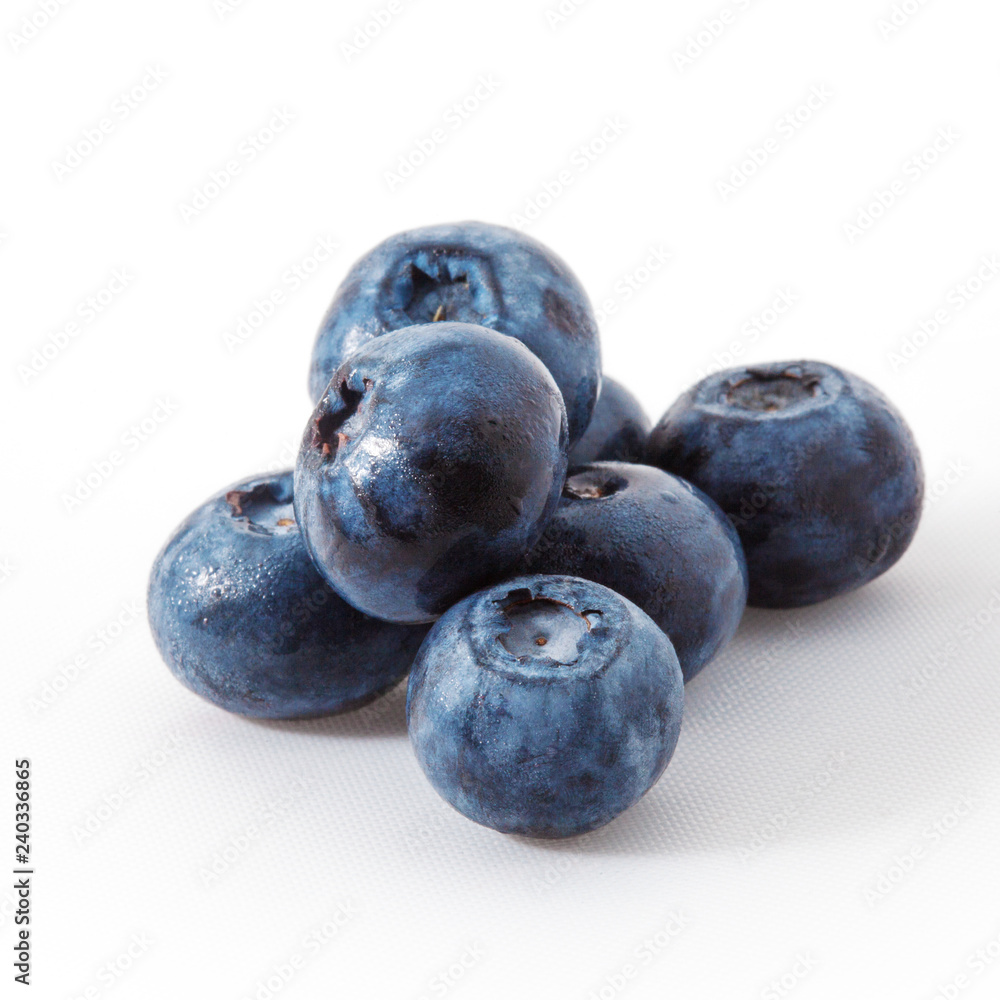 Fresh blueberry isolated on white. A bunch of berries on a white background Fresh blueberry isolated on white. A bunch of berries on a white background