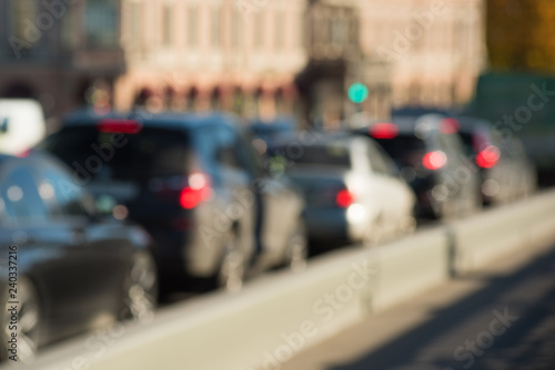 Background with blurred city and road with cars, photo