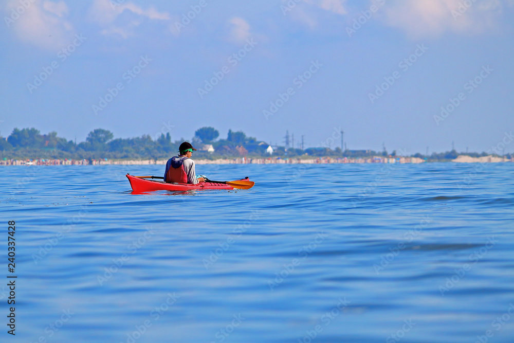 Fototapeta premium Kayaking in the blue sea