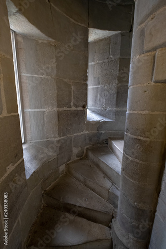 Interior spiral stone staircase in the tower