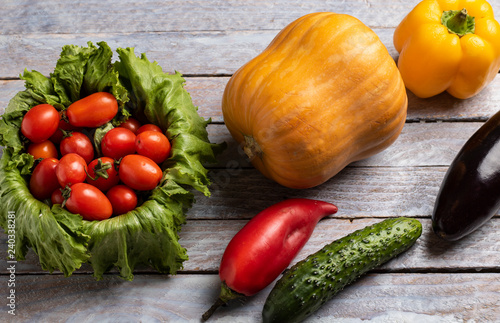 pumpkin next to vegetables