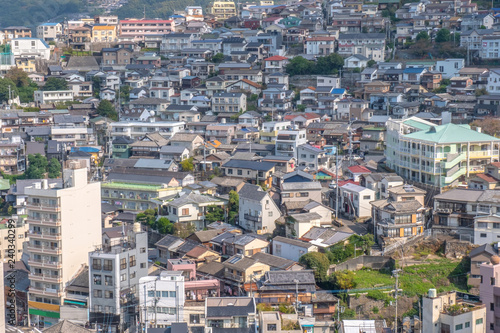 Panorama view of Nagasaki city with montain and blue sky background, Cityscape, Nagasaki, Kyushu, Japan