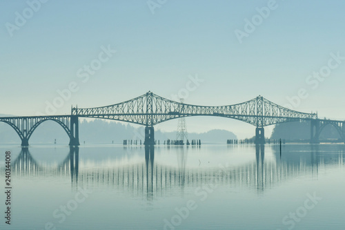 A bridge over the Coos River bay at its mouth next to the Oregon Dunes