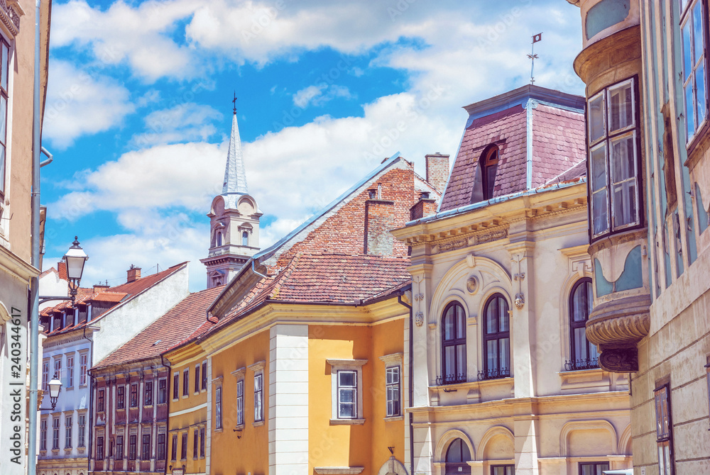 Historic buildings in Sopron, Hungary, purple filter