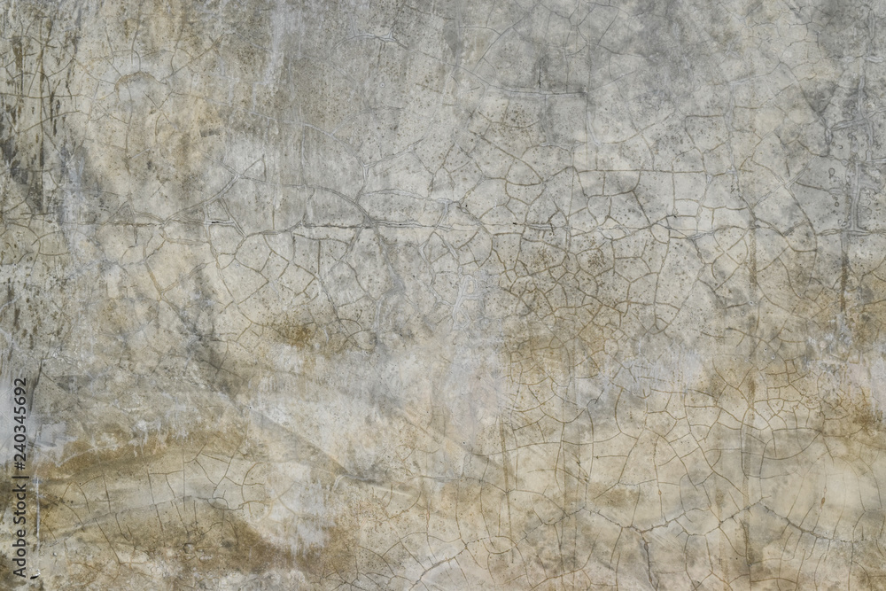 Grunge concrete wall with crack and stains in industrial building. Cement texture for design and background. Grunge concrete wall with crack and stains in industrial building. Cement texture for design and background.