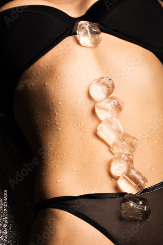 Ice cubes on a women's suxual body in underwear Stock Photo | Adobe Stock