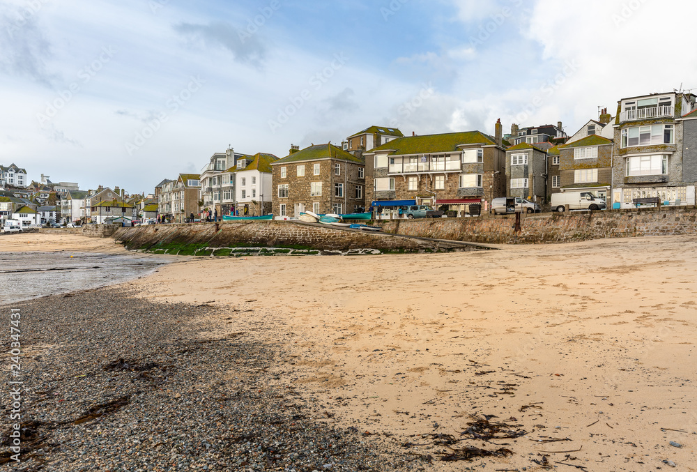 View from the beach towards St Ives, at Low Tide in North Cornwall, UK View from the beach towards St Ives, at Low Tide in North Cornwall, UK