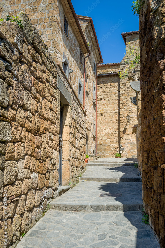 Vertica photo of Civita di Bagnoregio old town narrow street