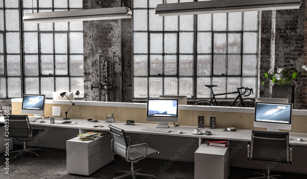 Fototapeta premium Großraumbüro in Industriehalle mit mehreren Arbeitsplätzen am Tag