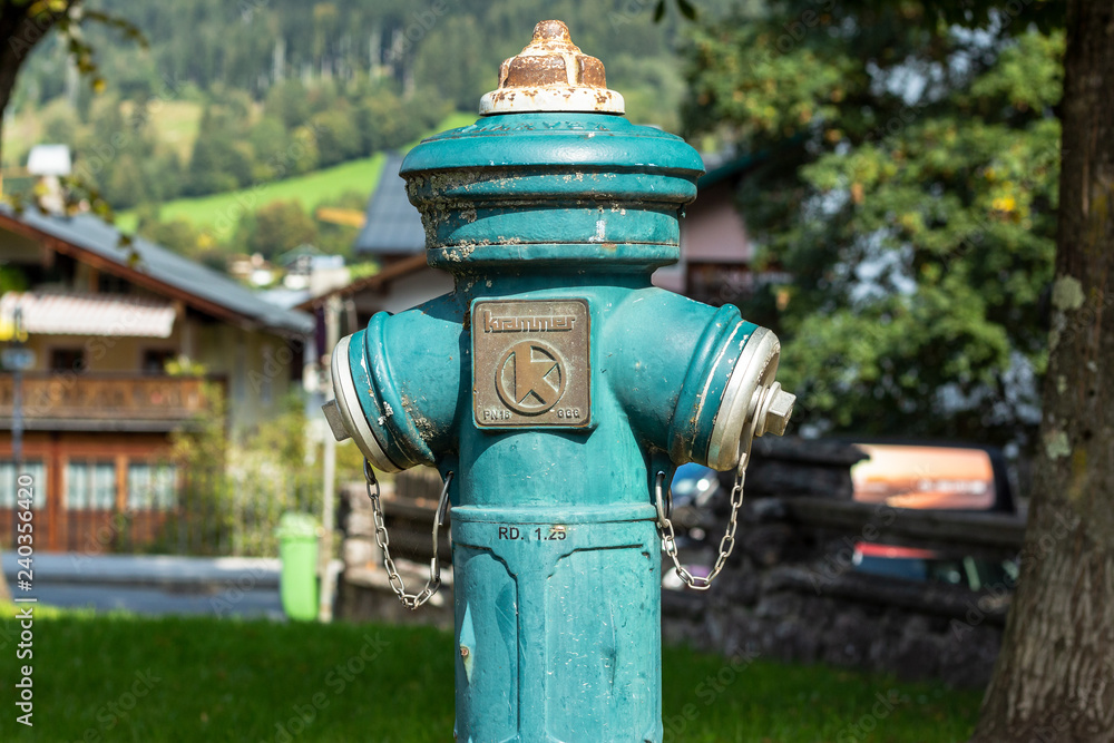 Kitzbuehel, Tirol/Austria - September 18 2018: fire hydrant in village center of Kitzbuehel shot with shallow depth of field Kitzbuehel, Tirol/Austria - September 18 2018: fire hydrant in village center of Kitzbuehel shot with shallow depth of field
