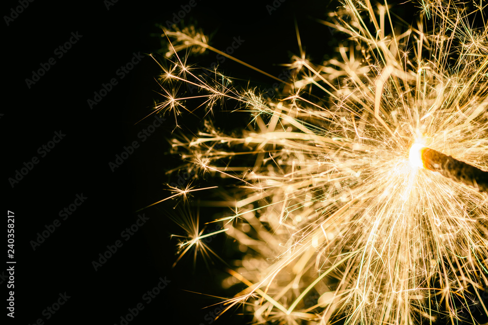 Obraz premium Wunderkerze als Hintergrund zum Thema Silvester