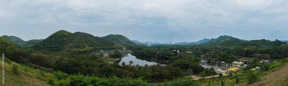 Panoramic mountain and river on the day of the blue sky