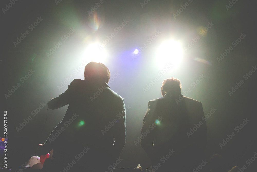 silhouette of Two DJ performing at a concert