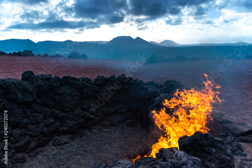 Vulcanic Landscape with fire of the Timanfaya National Park in Lanzarote, Canary Islands, Spain