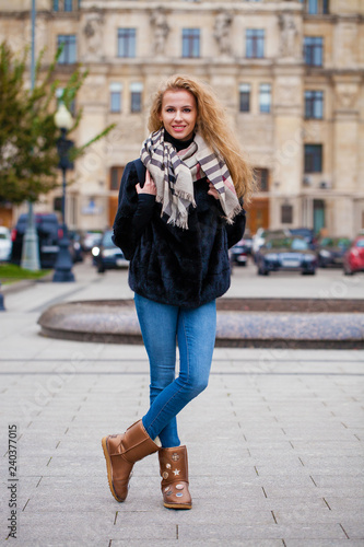 Young beautiful woman in winter coat